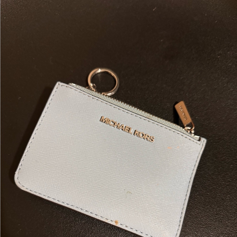 Used Michael Kors baby blue walley